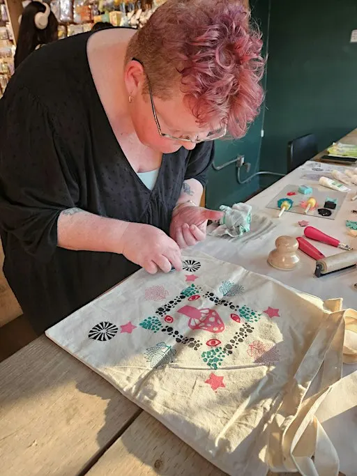 Block printmaking on tote bag