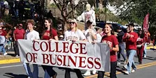 Herbert Wertheim College of Business Walks in the Homecoming Parade!