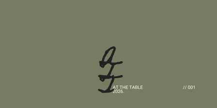 AT THE TABLE