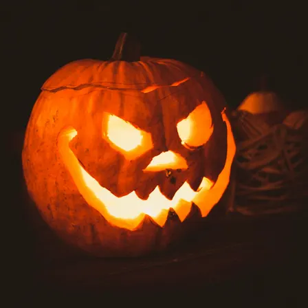 Halloween pumpkin carving and spooky cake making