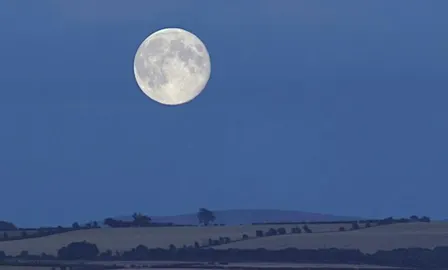 A Harvest Moon lights up the landscape