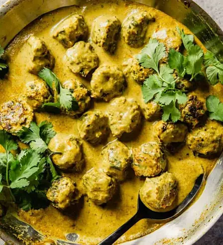 Across the Indian Ocean w/ Annie M: Coconut Curried Meat balls & bean pilaf