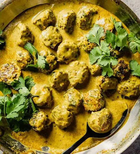 Across the Indian Ocean w/ Annie M: Coconut Curried Meat balls & bean pilaf