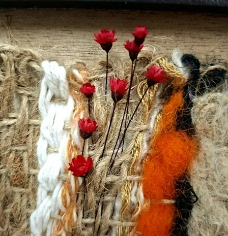 Weaving with fabric and flowers