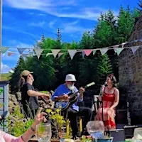 The Flying Thimbles: An Evening of Toe-Tapping Folk Music & Delicious Food!