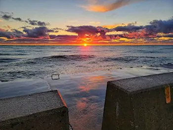Twilight to Sunrise Yoga on the breakwater!